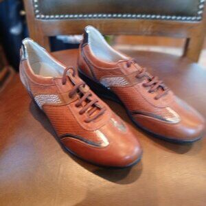 Sharp all leather uppers, sneakers.